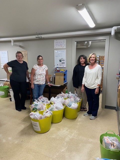 Hub International Insurance: Filling Weekend Bags for Johnson County Friends Feeding Friends